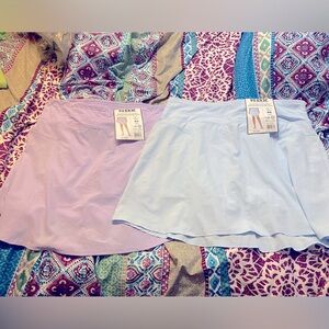 Set of 2 RBX stretch woven flared skirt with knit band and inside bike shorts